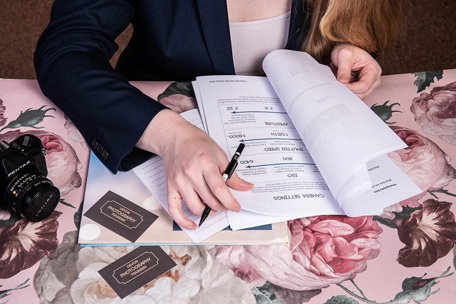 camera workshops devon photography training (2) View of table with photography worksheets and camera