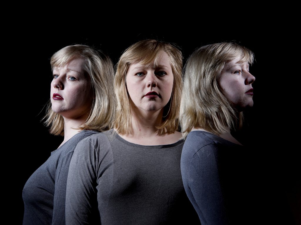About me continued Image of Gem three times on black background facing different ways. Head and shoulder shot. Taken with a long exposure, in a dark studio and using flash after changing position